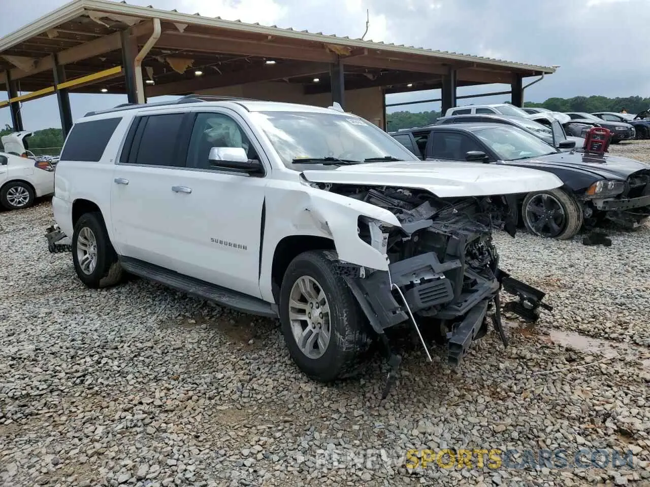 4 Photograph of a damaged car 1GNSKHKC9KR186216 CHEVROLET SUBURBAN 2019