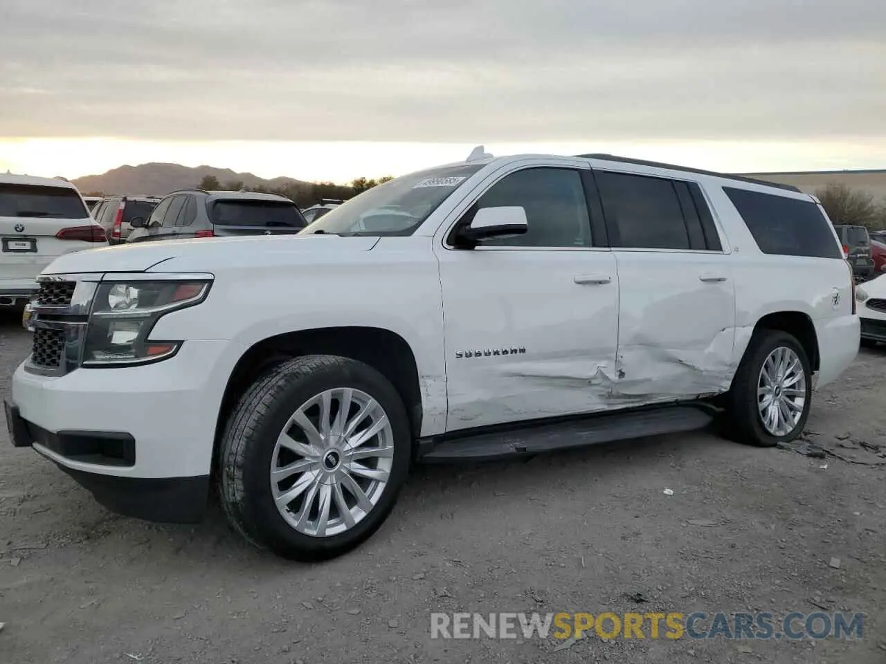1 Photograph of a damaged car 1GNSKHKCXKR119530 CHEVROLET SUBURBAN 2019