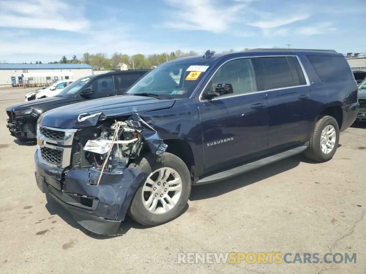 1 Photograph of a damaged car 1GNSKHKCXKR124680 CHEVROLET SUBURBAN 2019