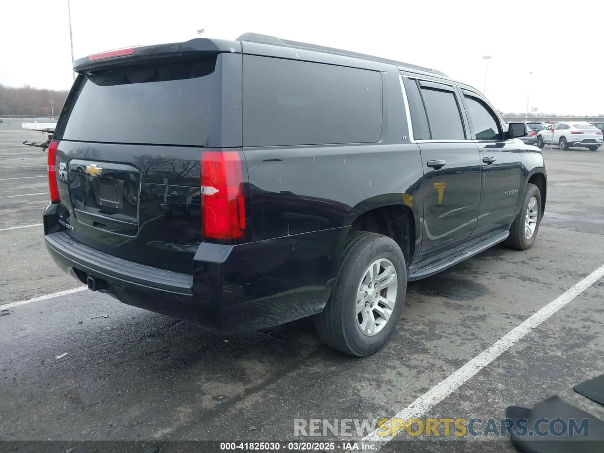 4 Photograph of a damaged car 1GNSKHKCXKR345468 CHEVROLET SUBURBAN 2019