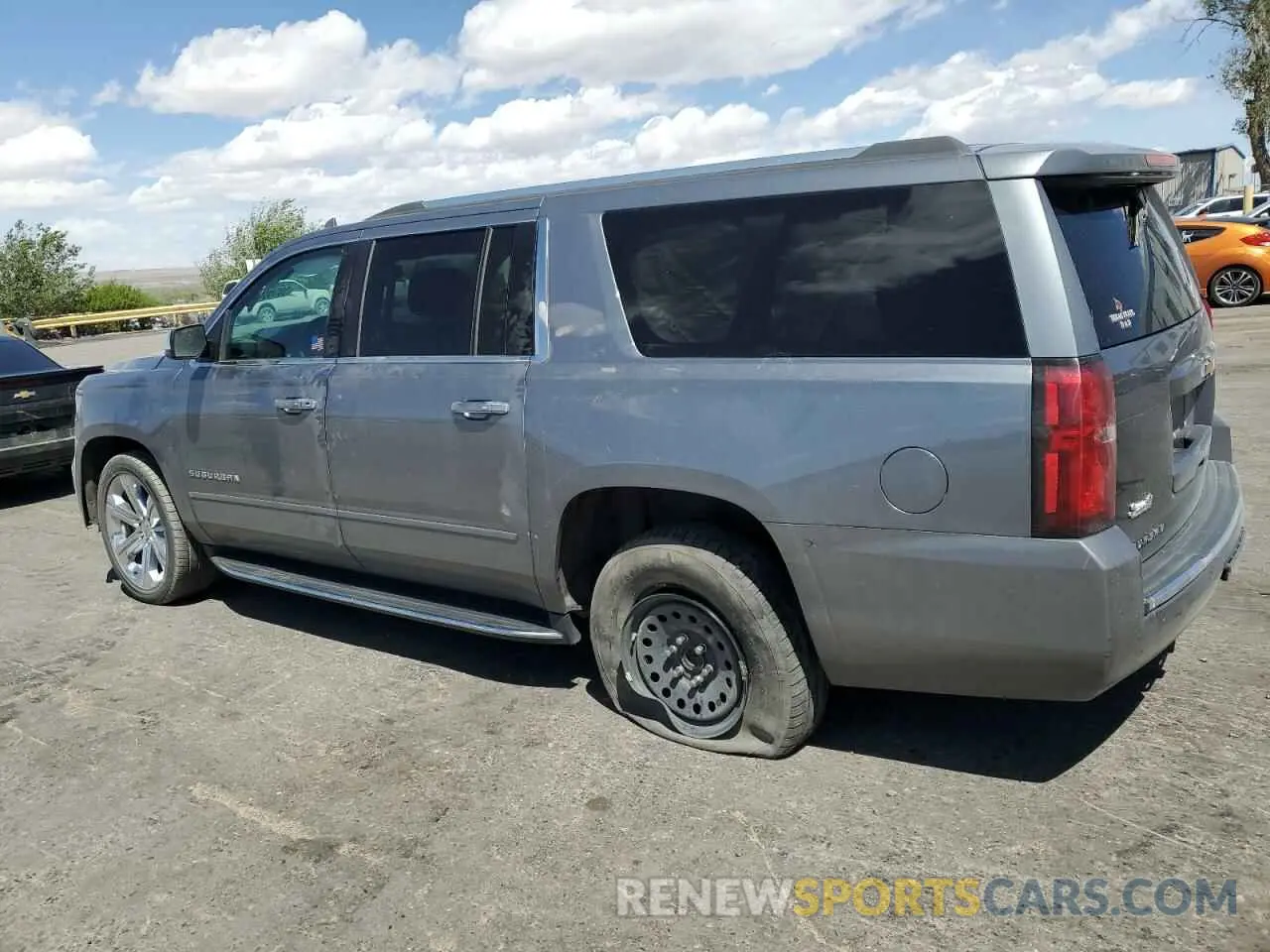 2 Photograph of a damaged car 1GNSKJKC3KR127668 CHEVROLET SUBURBAN 2019