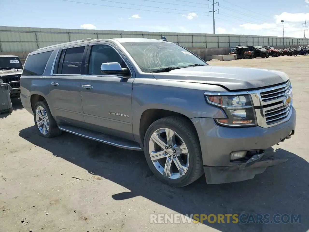 4 Photograph of a damaged car 1GNSKJKC3KR127668 CHEVROLET SUBURBAN 2019