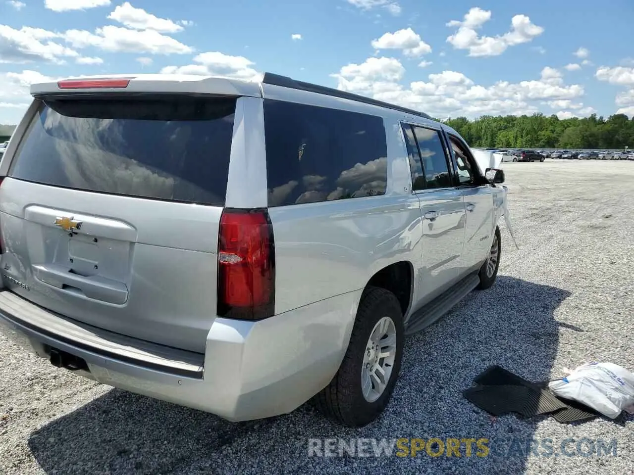 4 Photograph of a damaged car 1GNSCHKC7LR151169 CHEVROLET SUBURBAN 2020