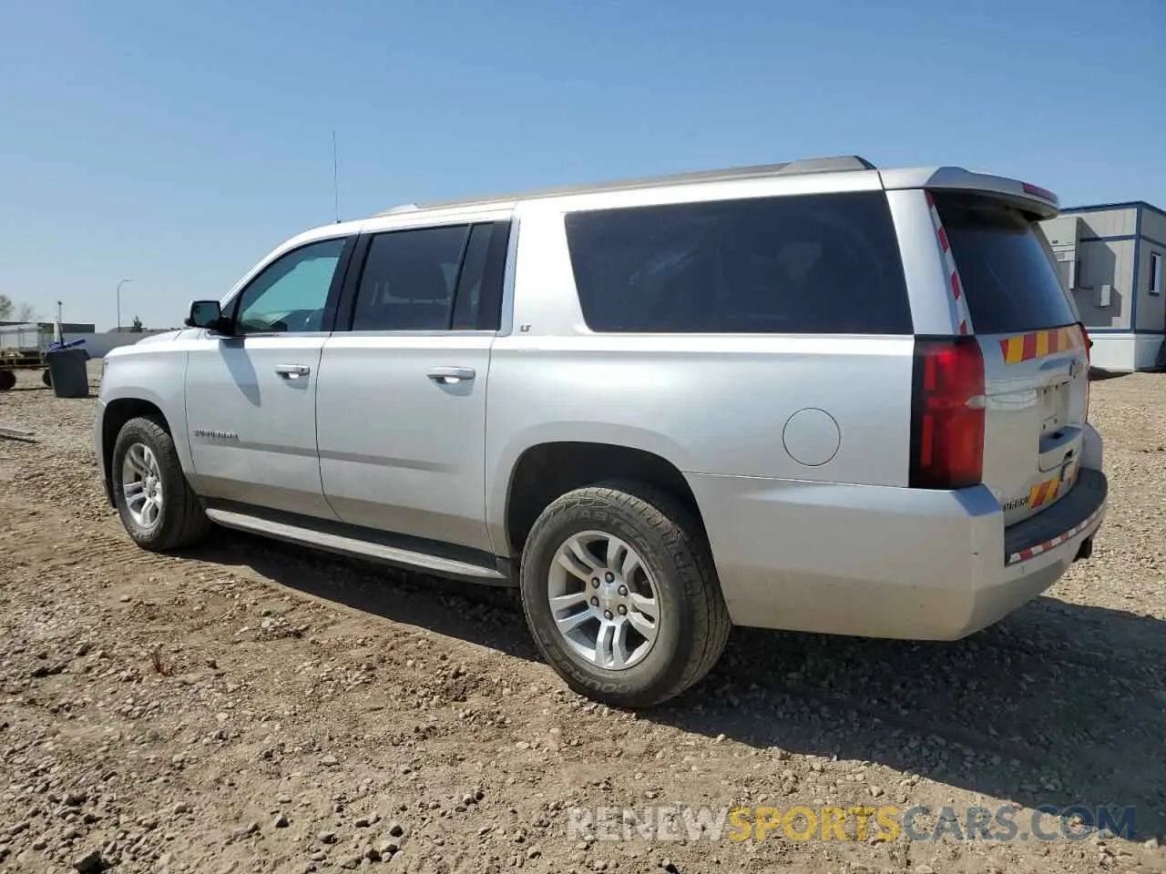 2 Photograph of a damaged car 1GNSKHKC0LR285945 CHEVROLET SUBURBAN 2020