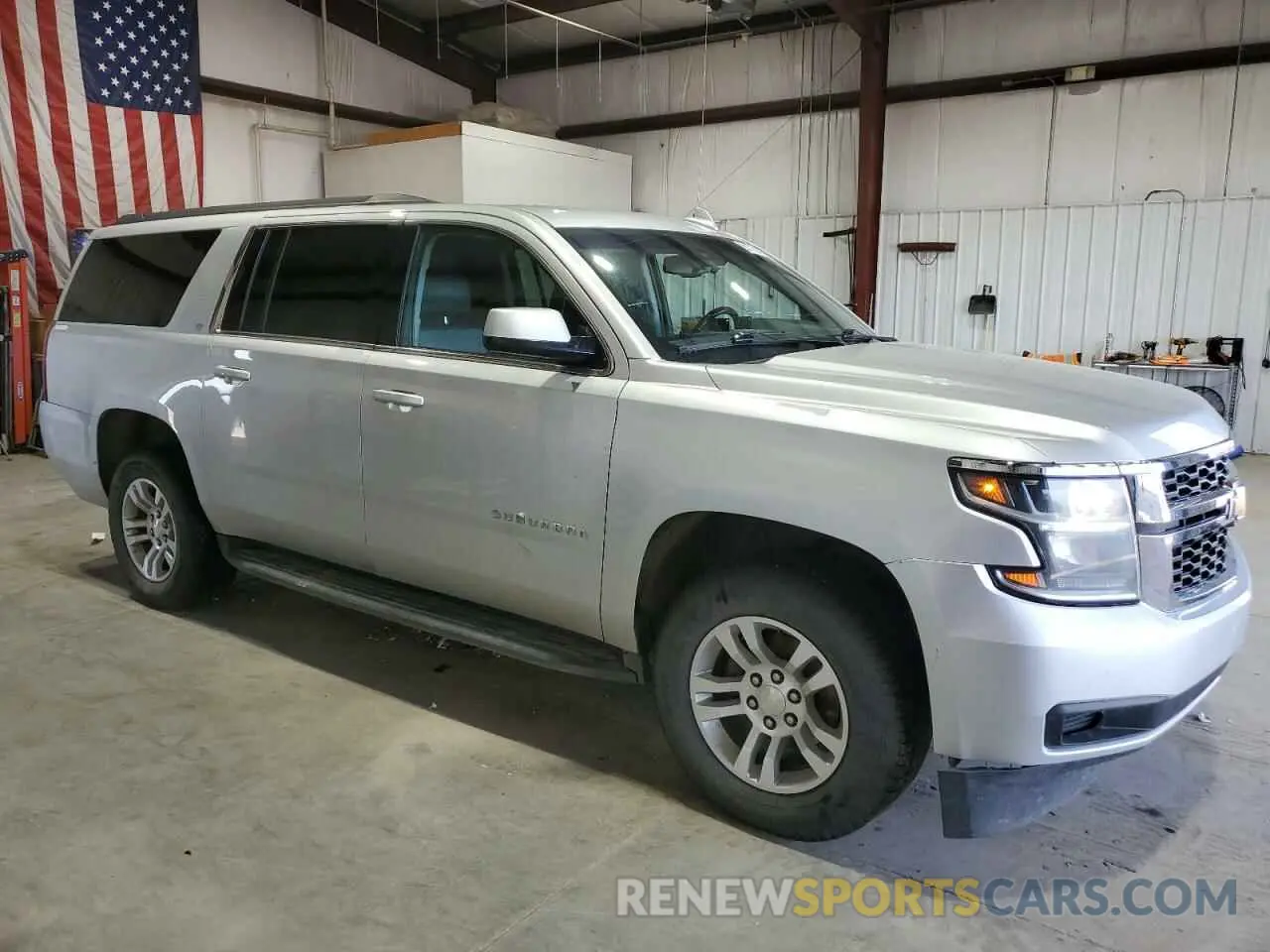 4 Photograph of a damaged car 1GNSKHKC6LR274514 CHEVROLET SUBURBAN 2020