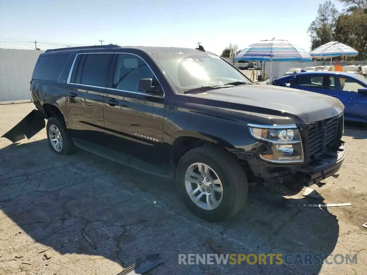 4 Photograph of a damaged car 1GNSKHKC7LR285084 CHEVROLET SUBURBAN 2020