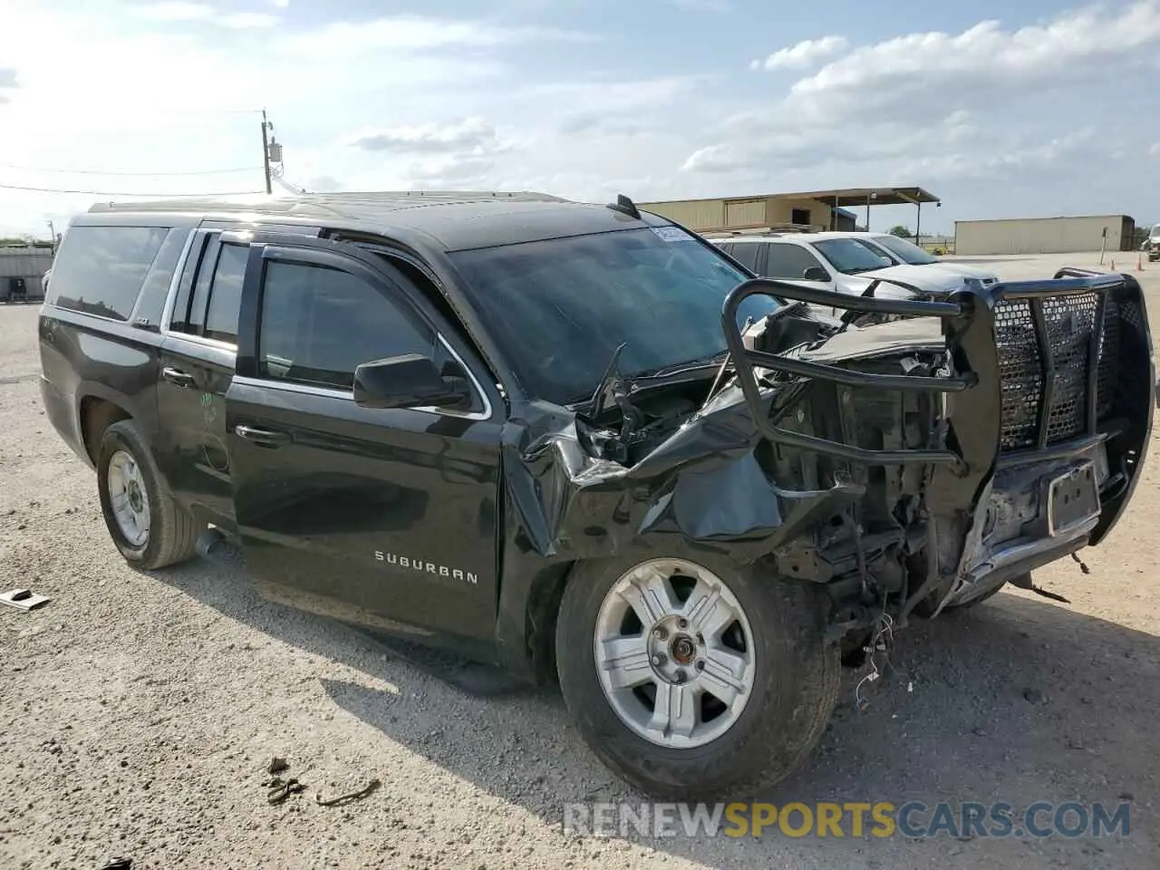 4 Photograph of a damaged car 1GNSKHKC9LR102624 CHEVROLET SUBURBAN 2020