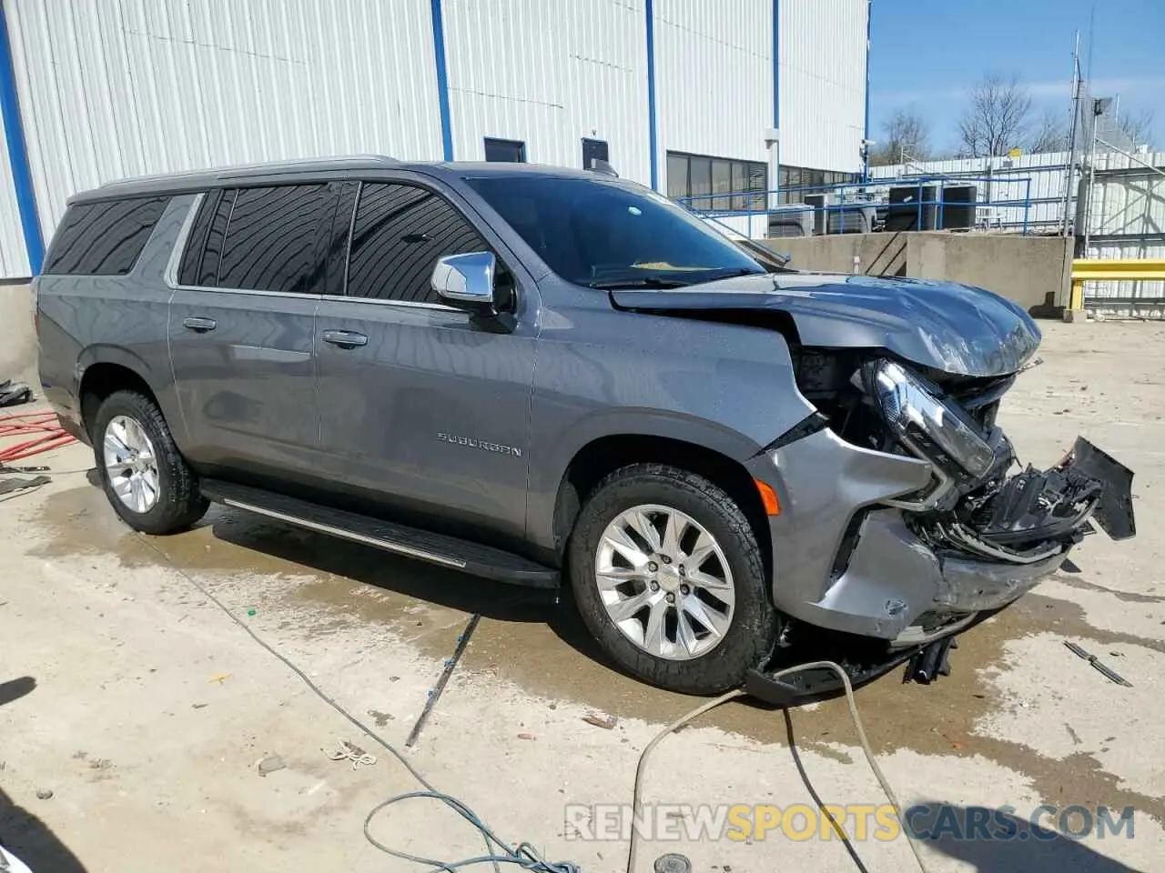 4 Photograph of a damaged car 1GNSCFKD6MR312402 CHEVROLET SUBURBAN 2021