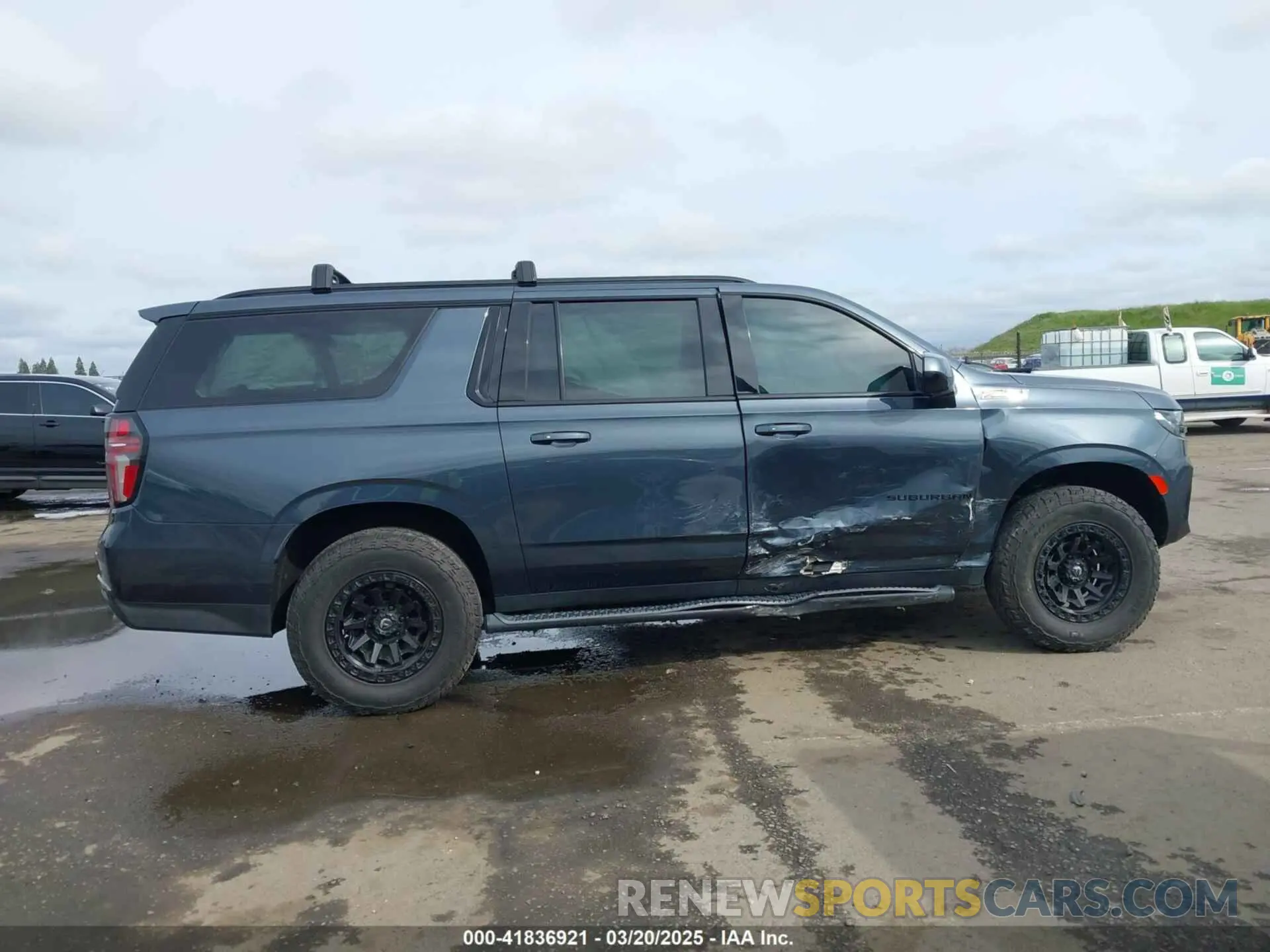 13 Photograph of a damaged car 1GNSKDKD2MR379098 CHEVROLET SUBURBAN 2021