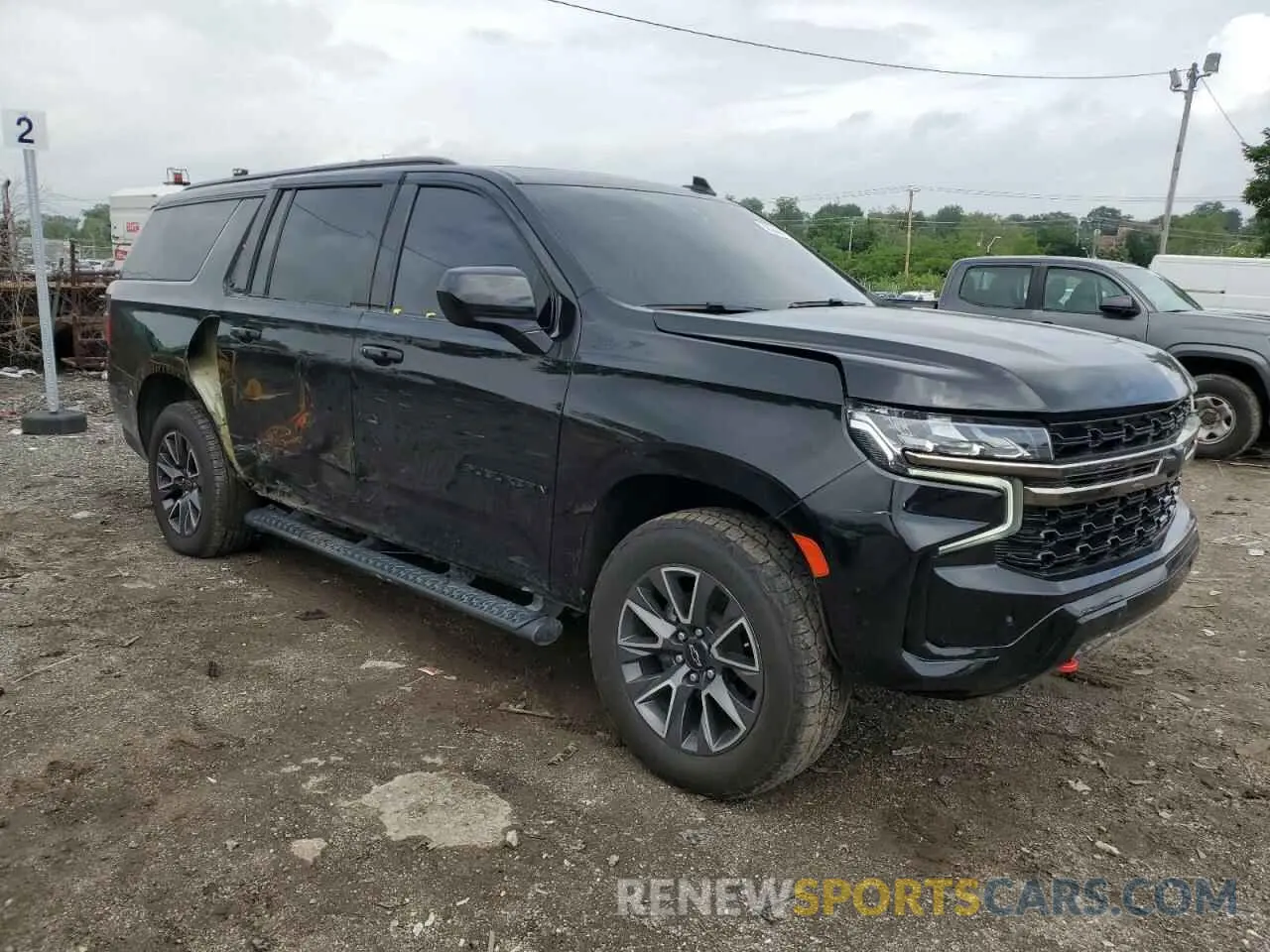 4 Photograph of a damaged car 1GNSKDKD3MR358924 CHEVROLET SUBURBAN 2021