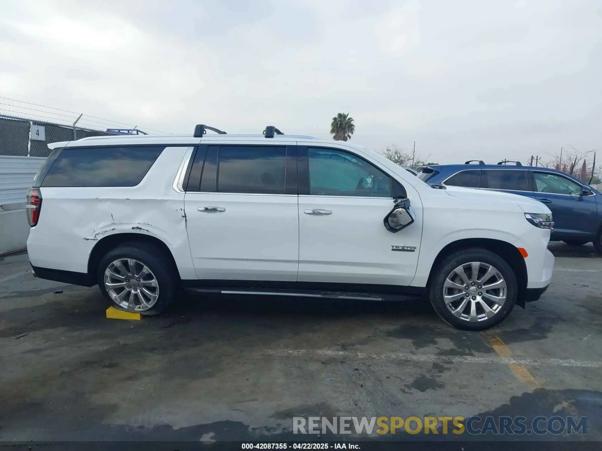 12 Photograph of a damaged car 1GNSKFKDXMR185737 CHEVROLET SUBURBAN 2021