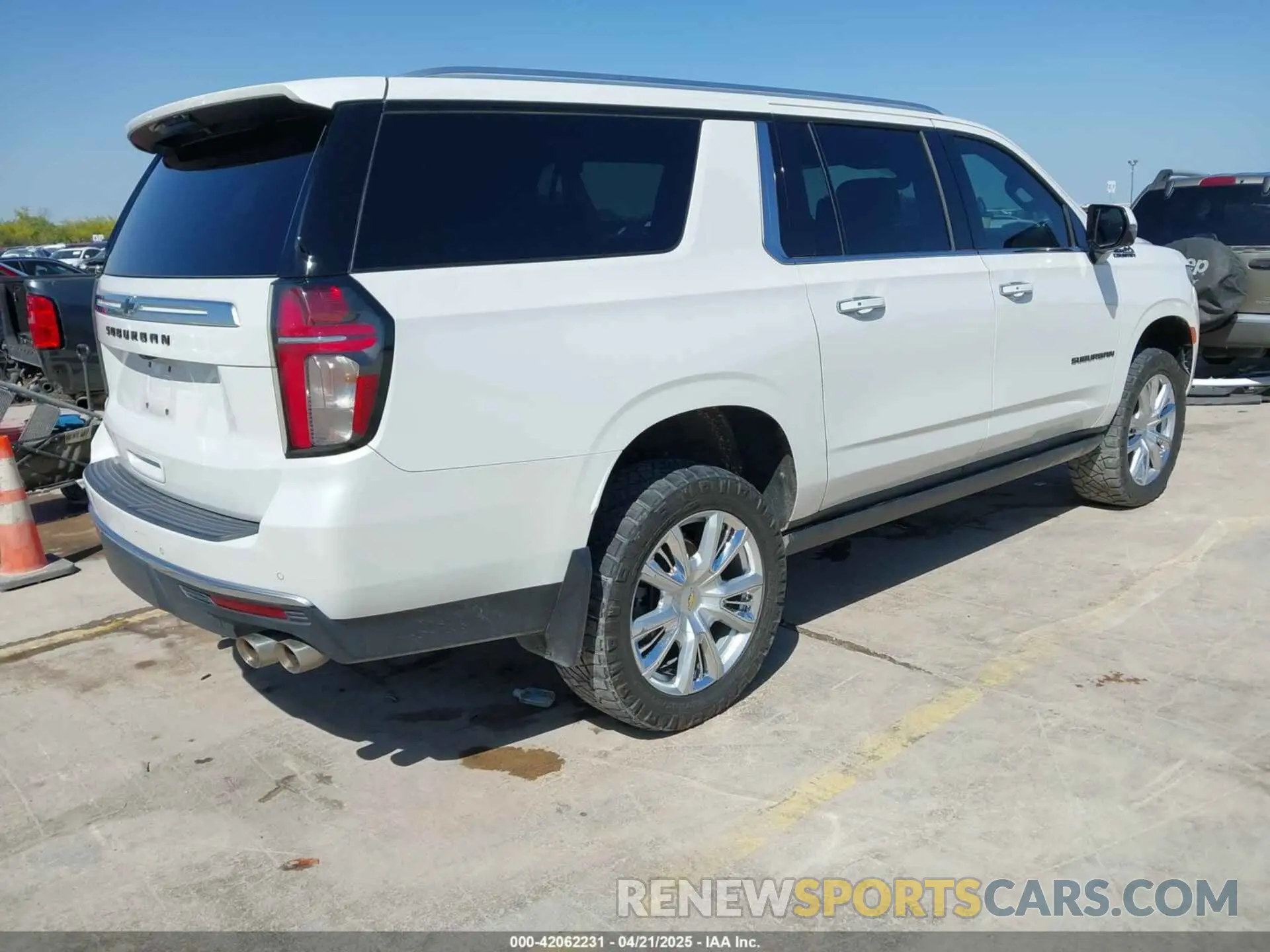 4 Photograph of a damaged car 1GNSKGKLXMR293496 CHEVROLET SUBURBAN 2021