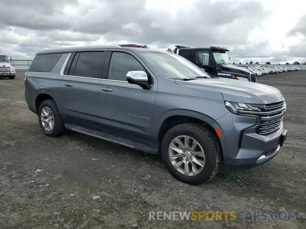 4 Photograph of a damaged car 1GNSKFKDXNR229883 CHEVROLET SUBURBAN 2022