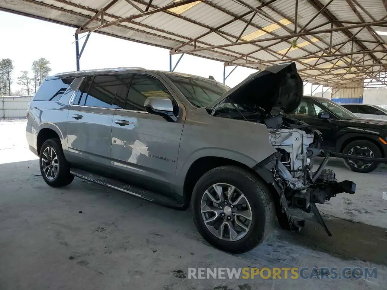 4 Photograph of a damaged car 1GNSCCKD5PR308814 CHEVROLET SUBURBAN 2023