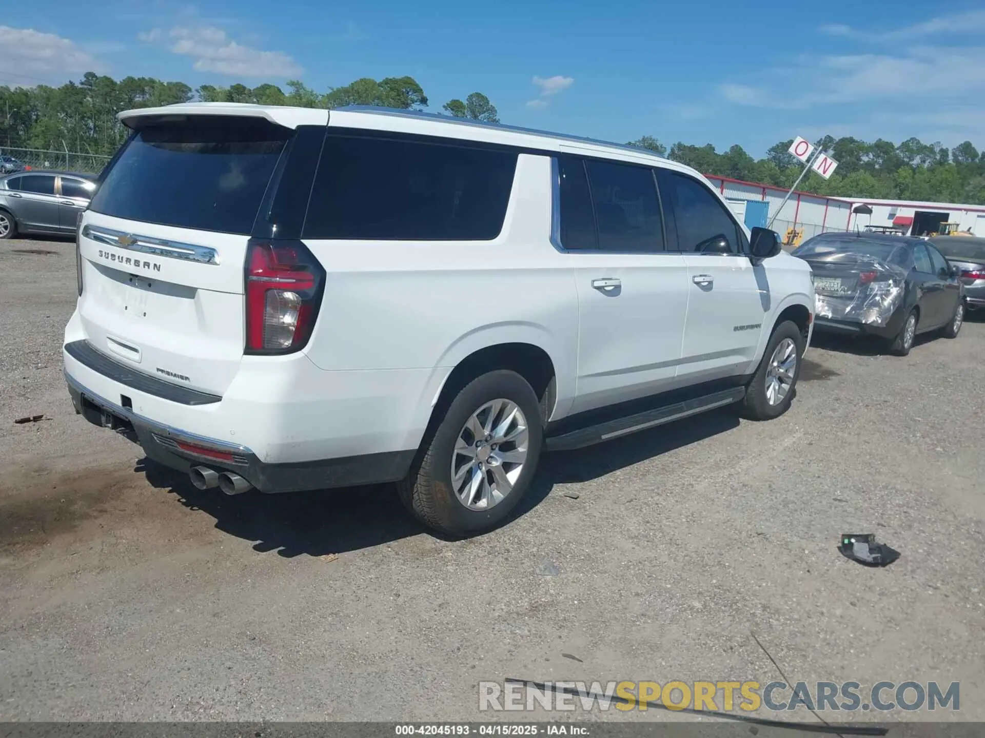4 Photograph of a damaged car 1GNSCFKDXPR371053 CHEVROLET SUBURBAN 2023