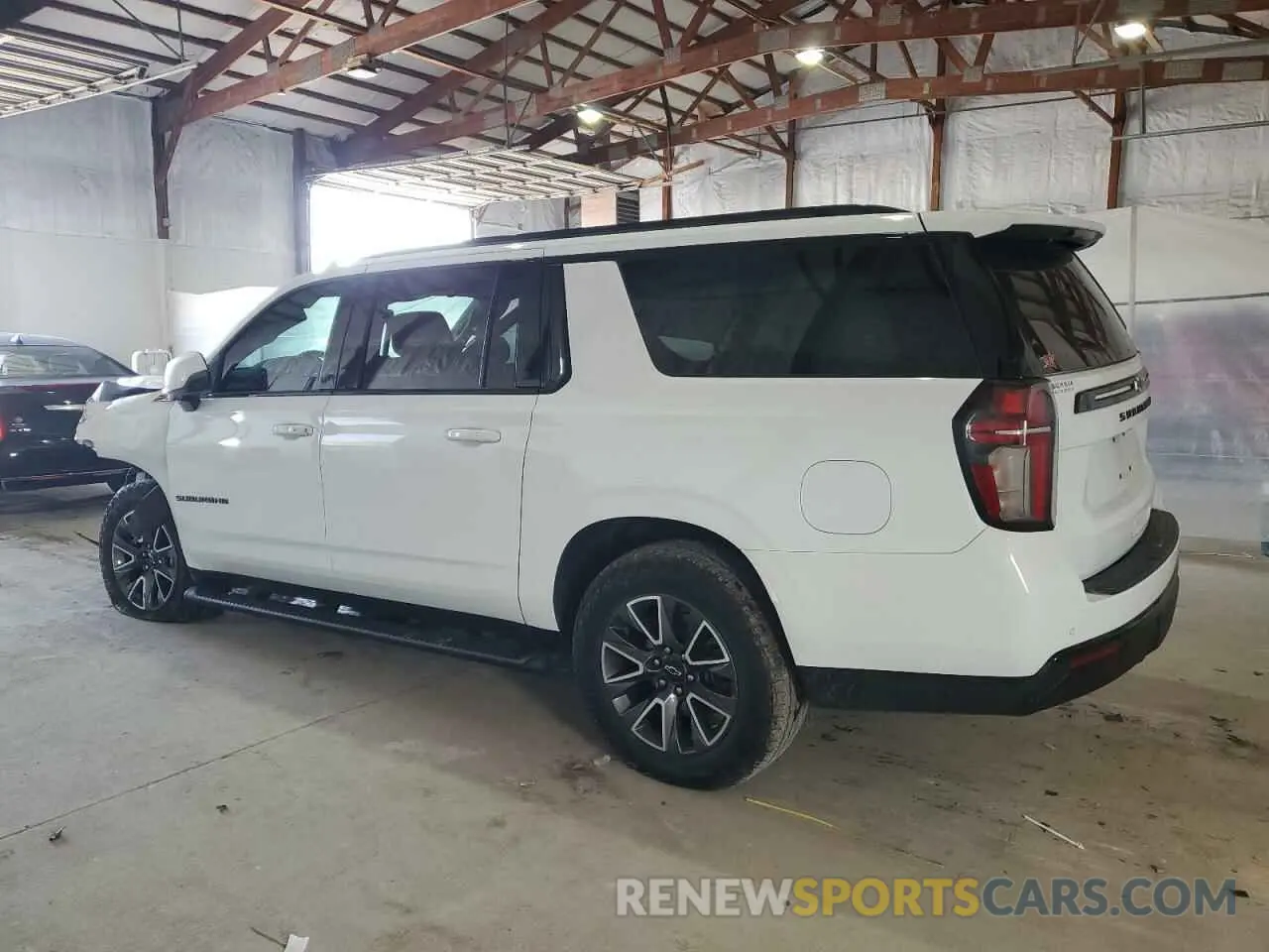 2 Photograph of a damaged car 1GNSKDKDXPR402129 CHEVROLET SUBURBAN 2023