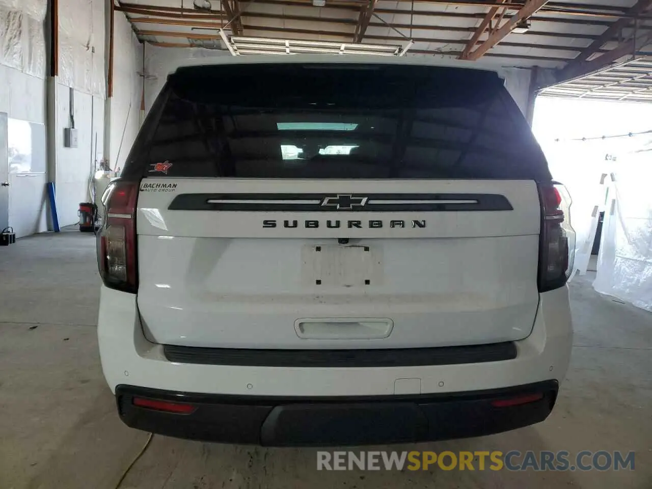 6 Photograph of a damaged car 1GNSKDKDXPR402129 CHEVROLET SUBURBAN 2023