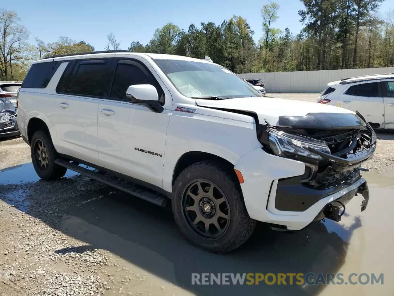 4 Photograph of a damaged car 1GNSKDKL5PR286474 CHEVROLET SUBURBAN 2023