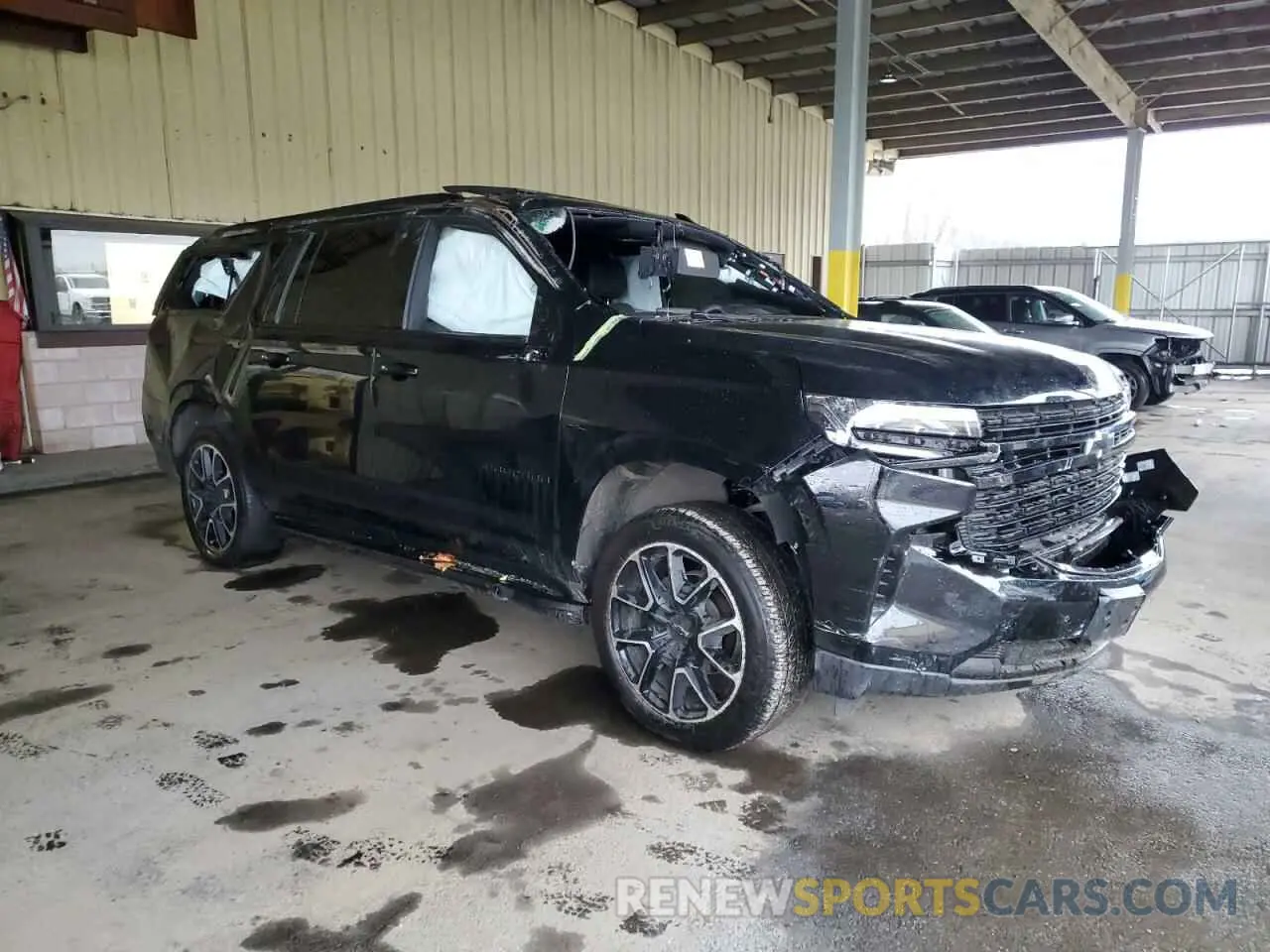 4 Photograph of a damaged car 1GNSKEKD0PR533494 CHEVROLET SUBURBAN 2023
