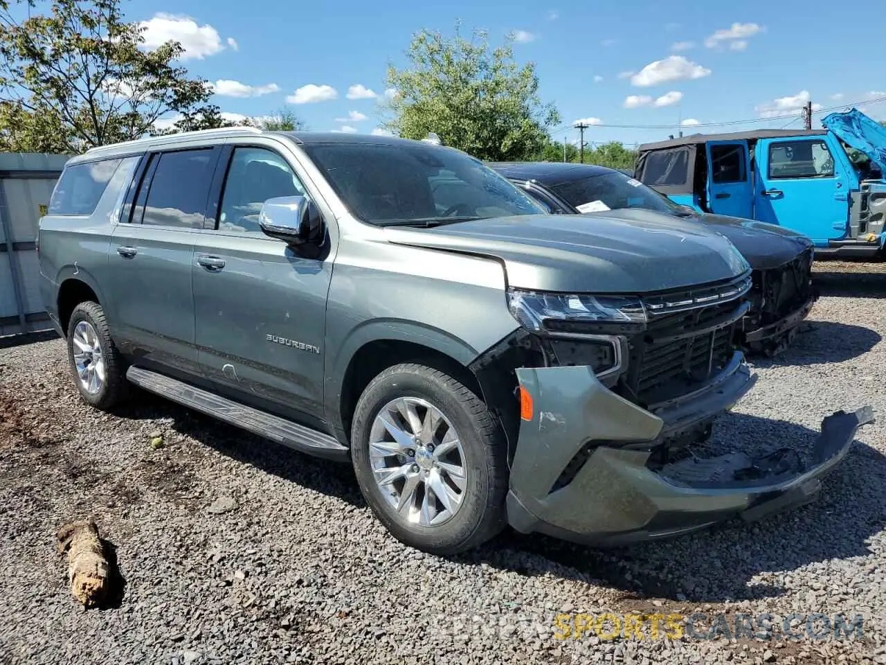 4 Photograph of a damaged car 1GNSKFKD0PR278738 CHEVROLET SUBURBAN 2023