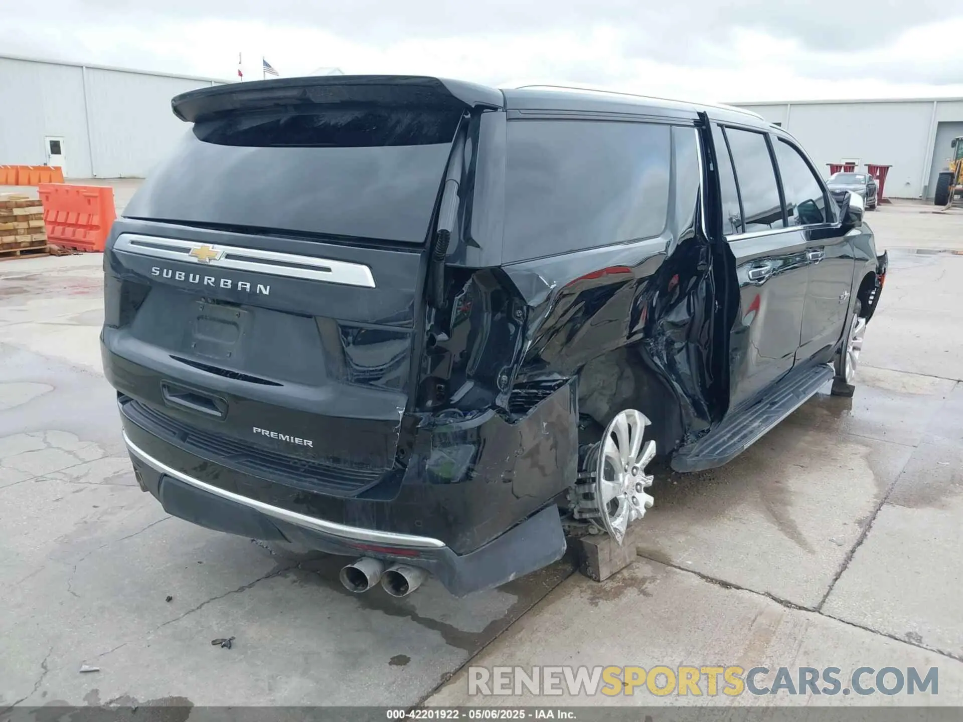 4 Photograph of a damaged car 1GNSCFKD9RR214598 CHEVROLET SUBURBAN 2024