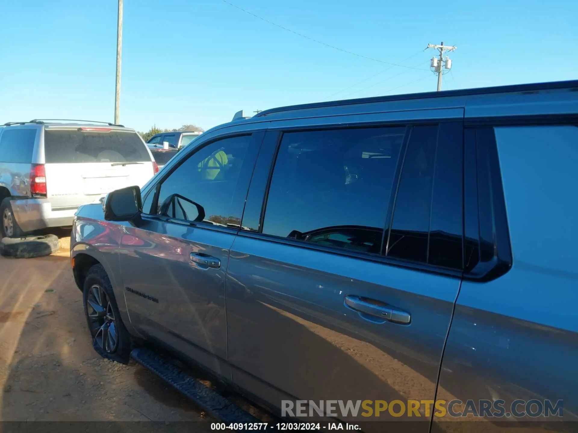 14 Photograph of a damaged car 1GNSKDKD1RR316405 CHEVROLET SUBURBAN 2024