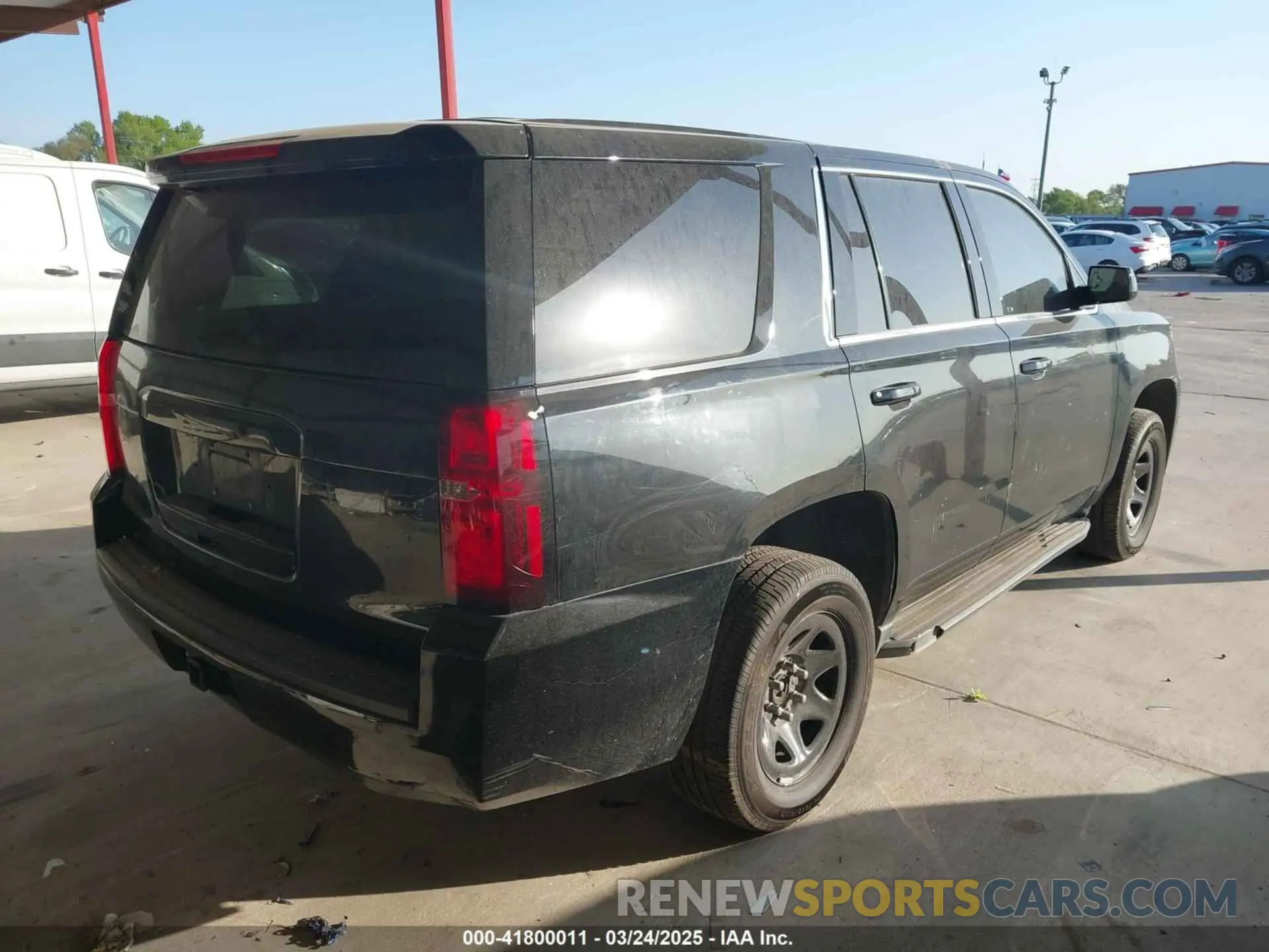 4 Photograph of a damaged car 1GNLCDEC0KR390778 CHEVROLET TAHOE 2019