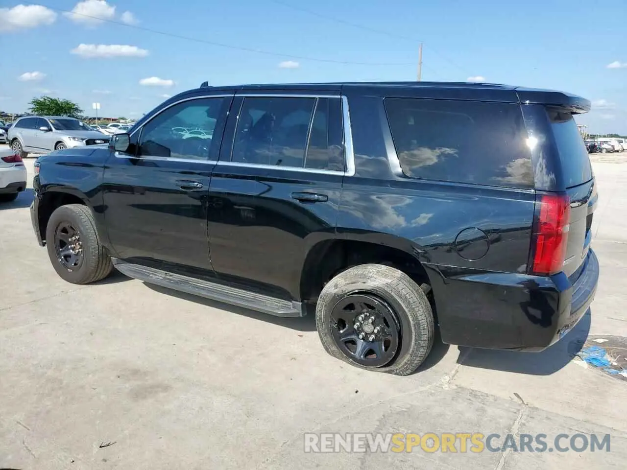 2 Photograph of a damaged car 1GNLCDEC1KR209848 CHEVROLET TAHOE 2019