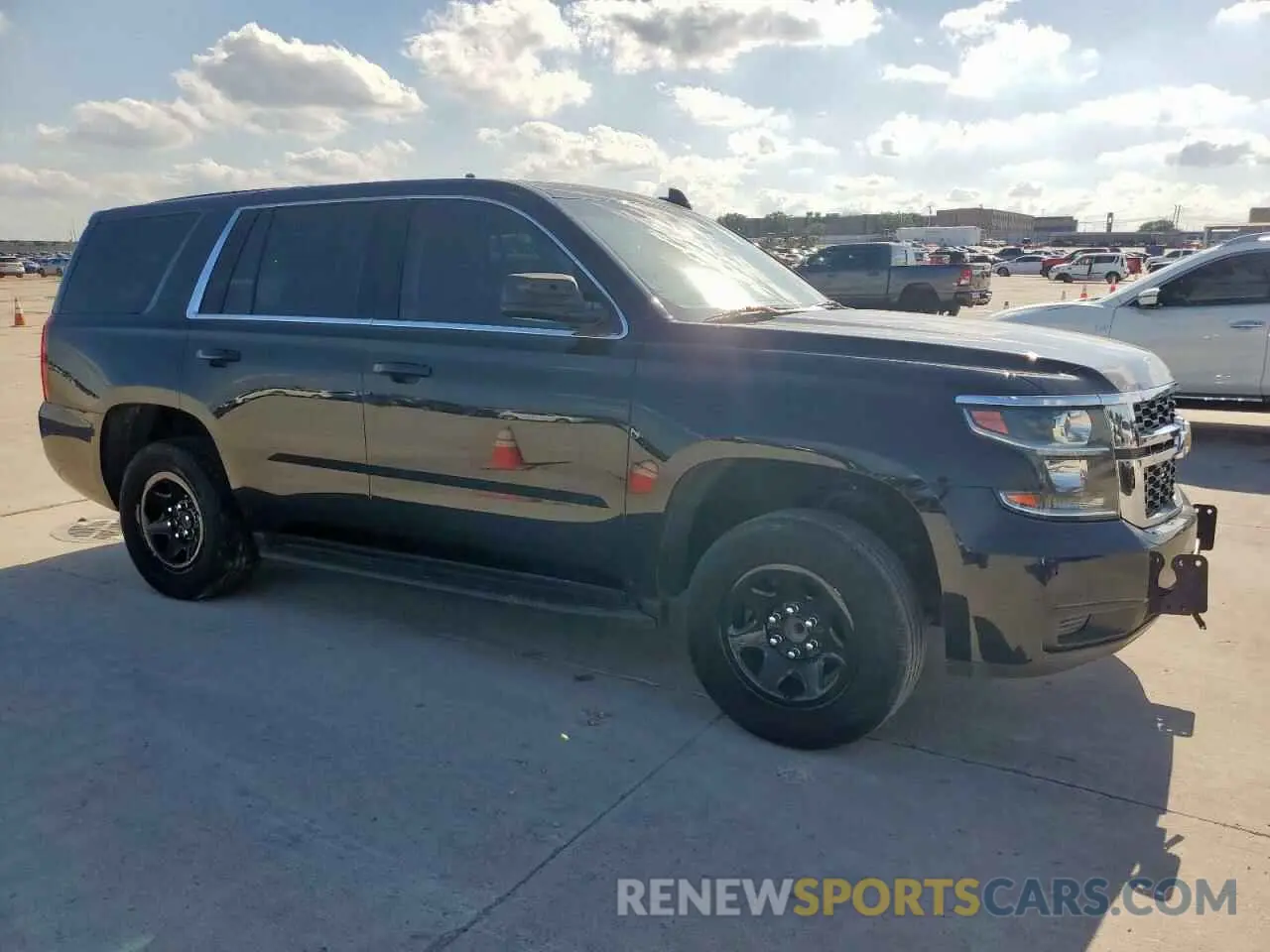 4 Photograph of a damaged car 1GNLCDEC1KR209848 CHEVROLET TAHOE 2019