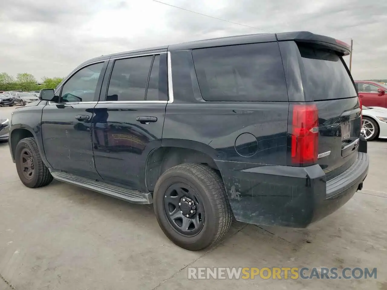 2 Photograph of a damaged car 1GNLCDEC3KR301348 CHEVROLET TAHOE 2019