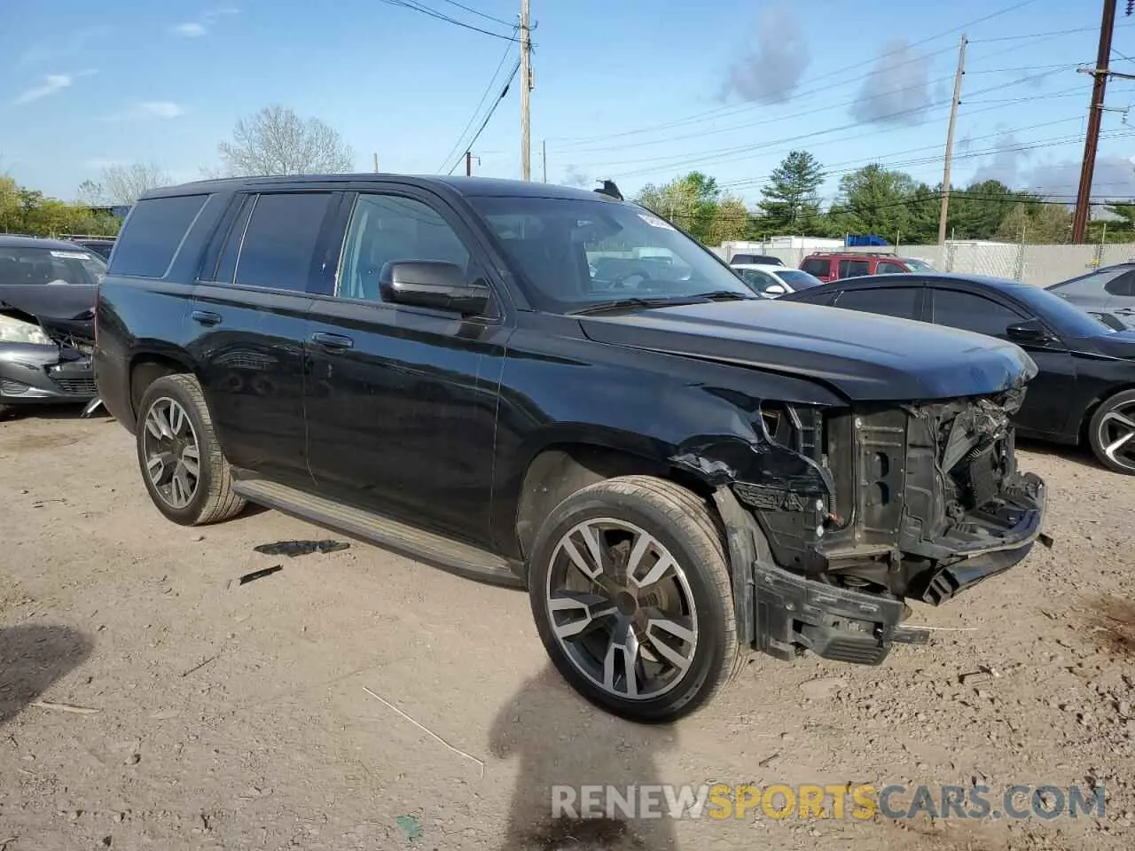 4 Photograph of a damaged car 1GNLCDECXKR327090 CHEVROLET TAHOE 2019