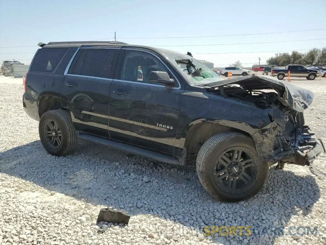 4 Photograph of a damaged car 1GNSCAKC6KR339624 CHEVROLET TAHOE 2019