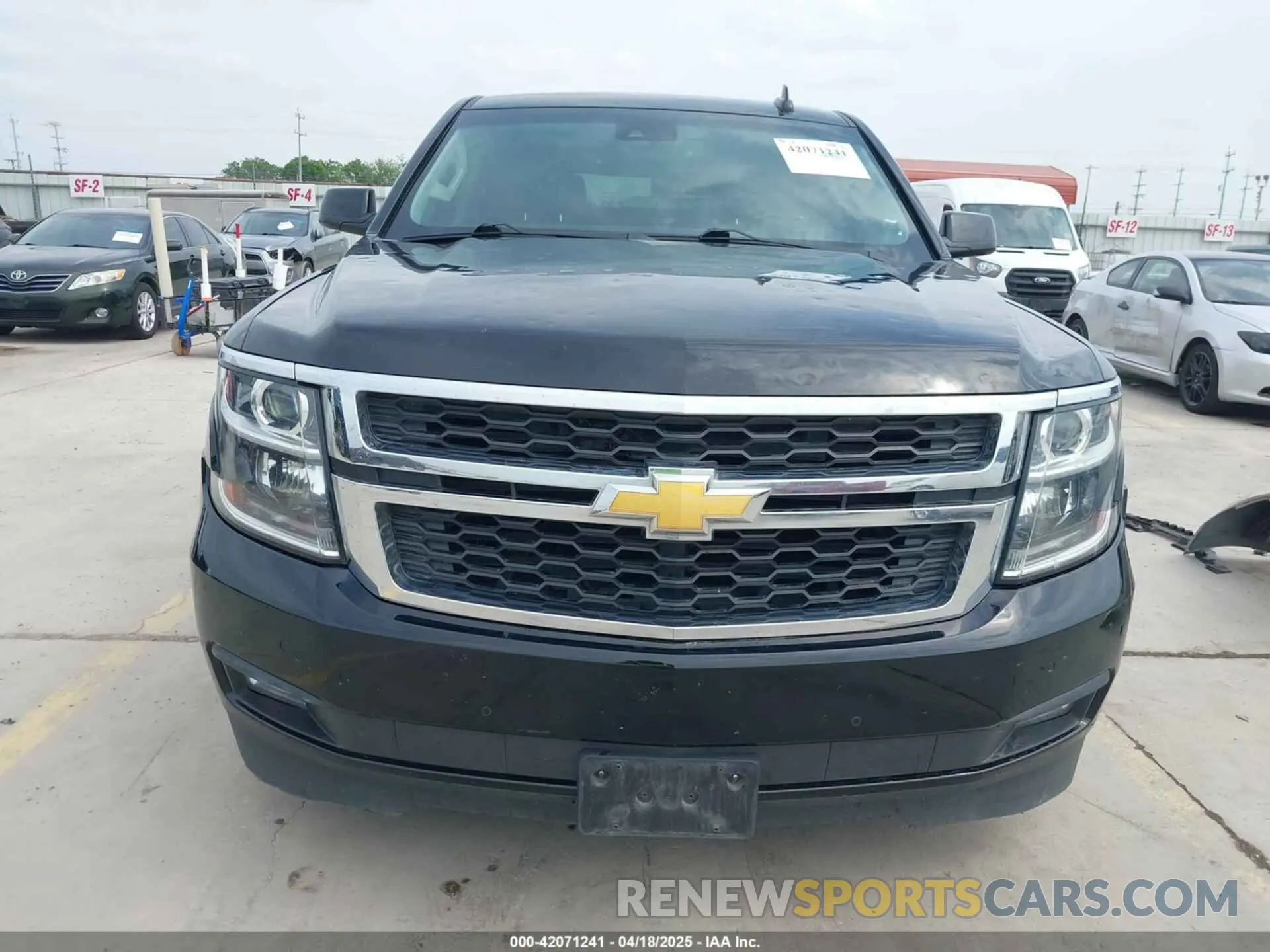 12 Photograph of a damaged car 1GNSCBKC0KR275635 CHEVROLET TAHOE 2019
