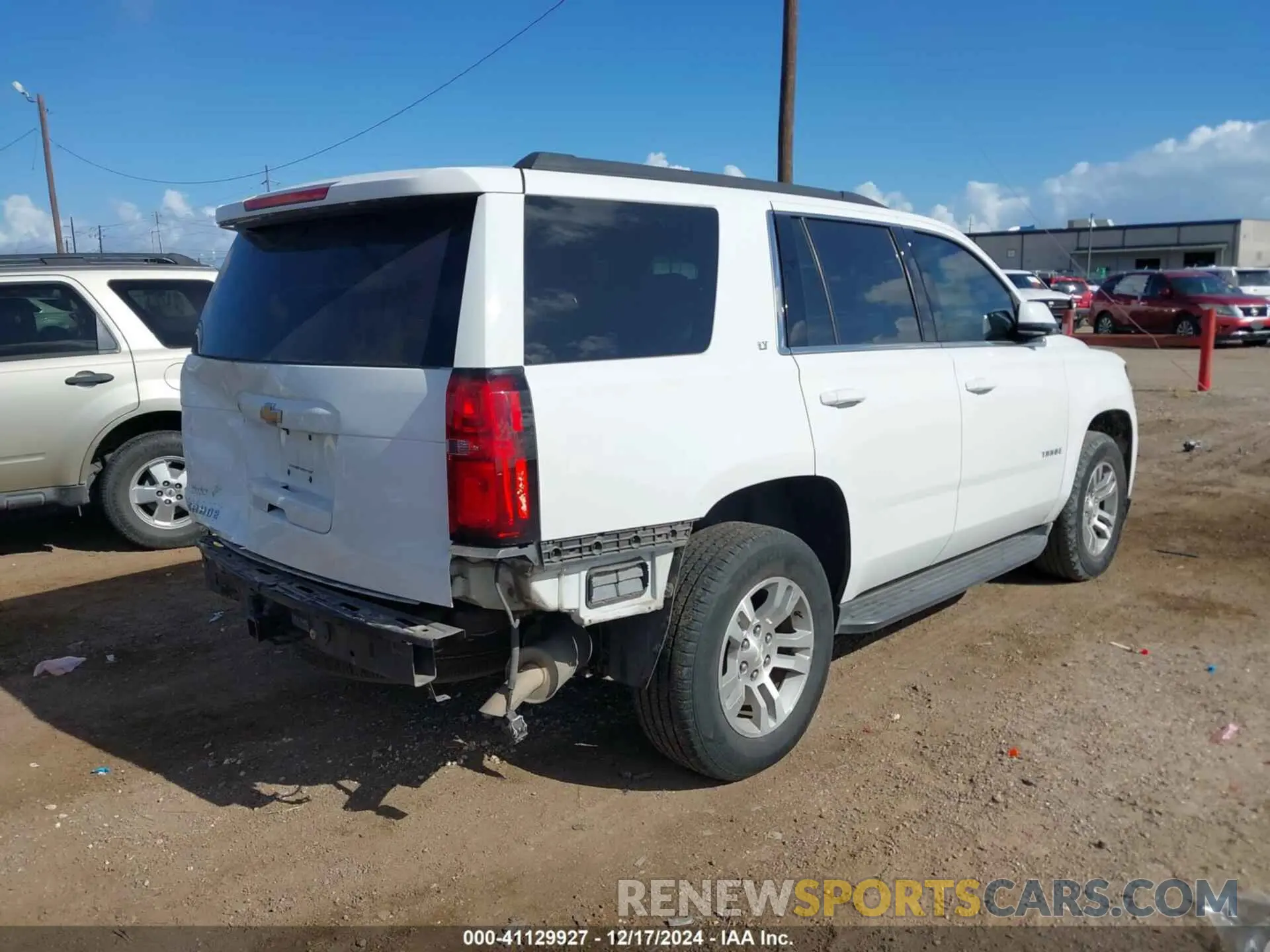 4 Photograph of a damaged car 1GNSCBKC0KR393975 CHEVROLET TAHOE 2019