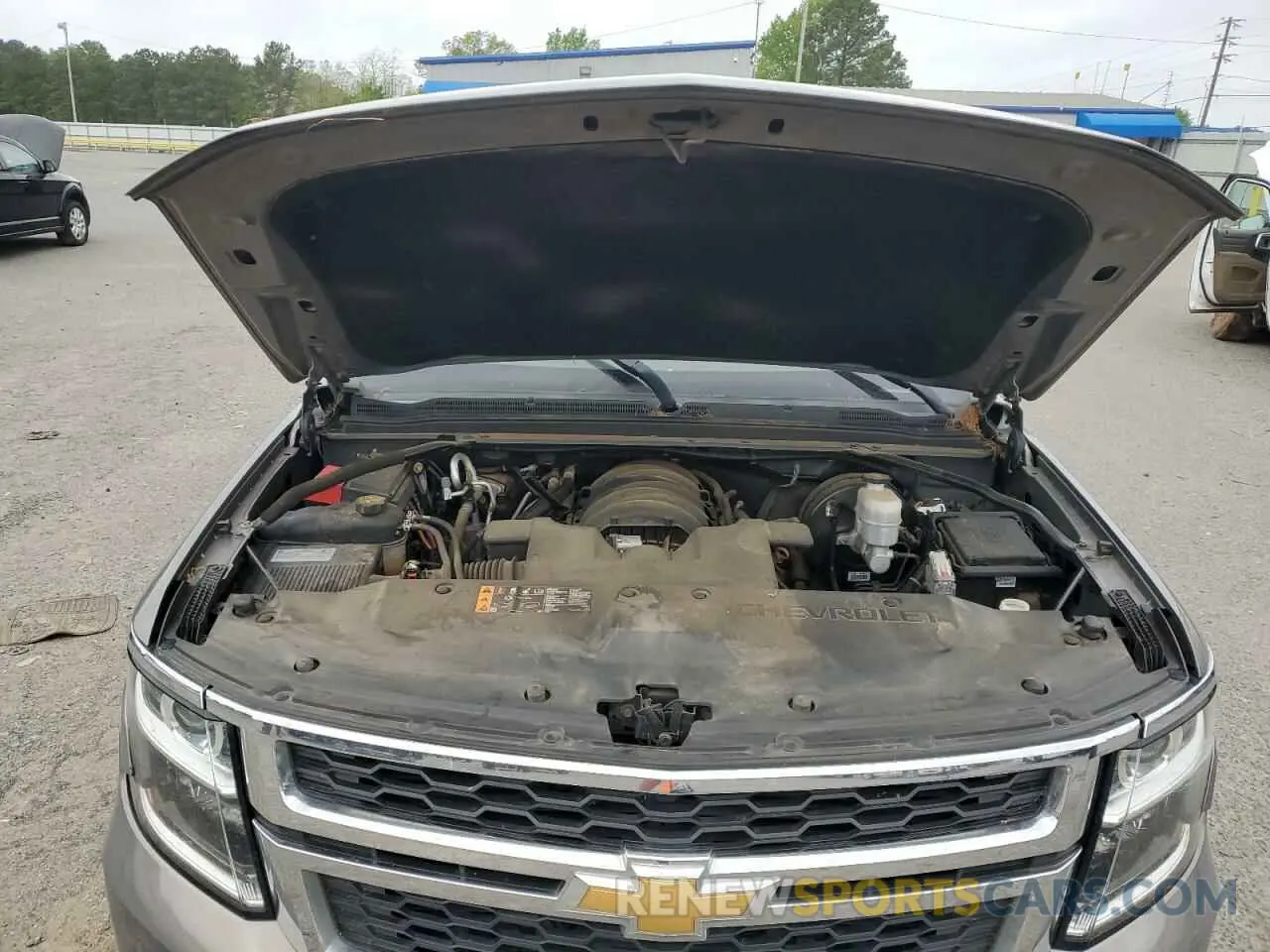 12 Photograph of a damaged car 1GNSCBKC1KR168030 CHEVROLET TAHOE 2019