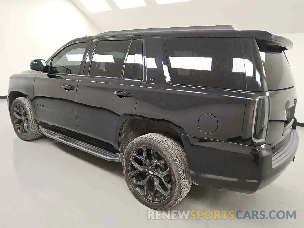 2 Photograph of a damaged car 1GNSCBKC4KR142943 CHEVROLET TAHOE 2019