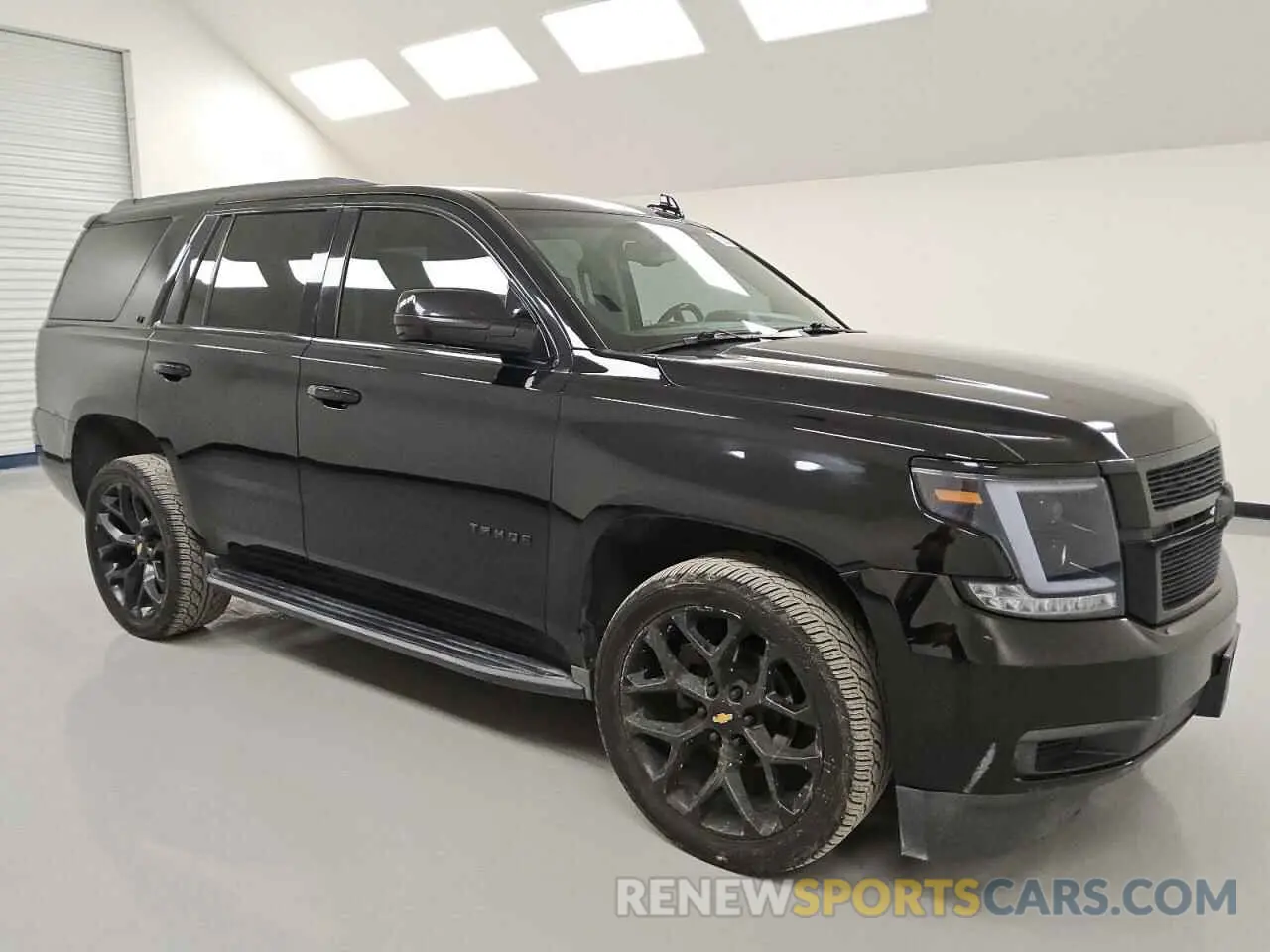 4 Photograph of a damaged car 1GNSCBKC4KR142943 CHEVROLET TAHOE 2019