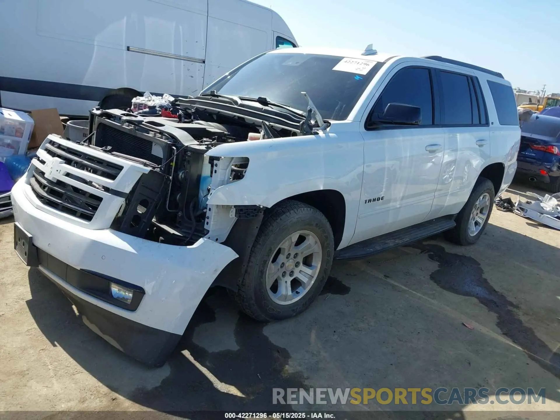 2 Photograph of a damaged car 1GNSCBKC9KR374907 CHEVROLET TAHOE 2019