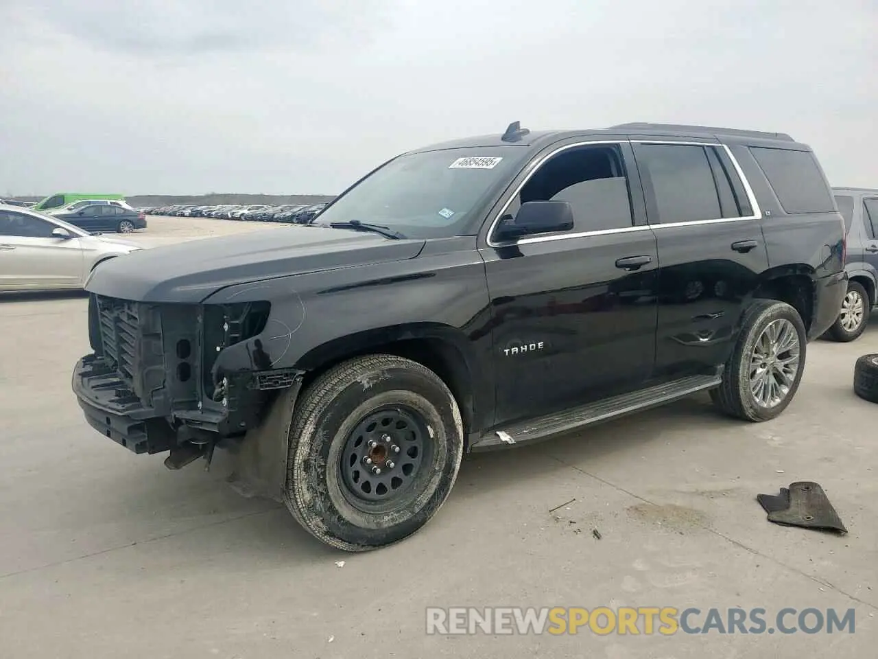 1 Photograph of a damaged car 1GNSCBKCXKR185912 CHEVROLET TAHOE 2019