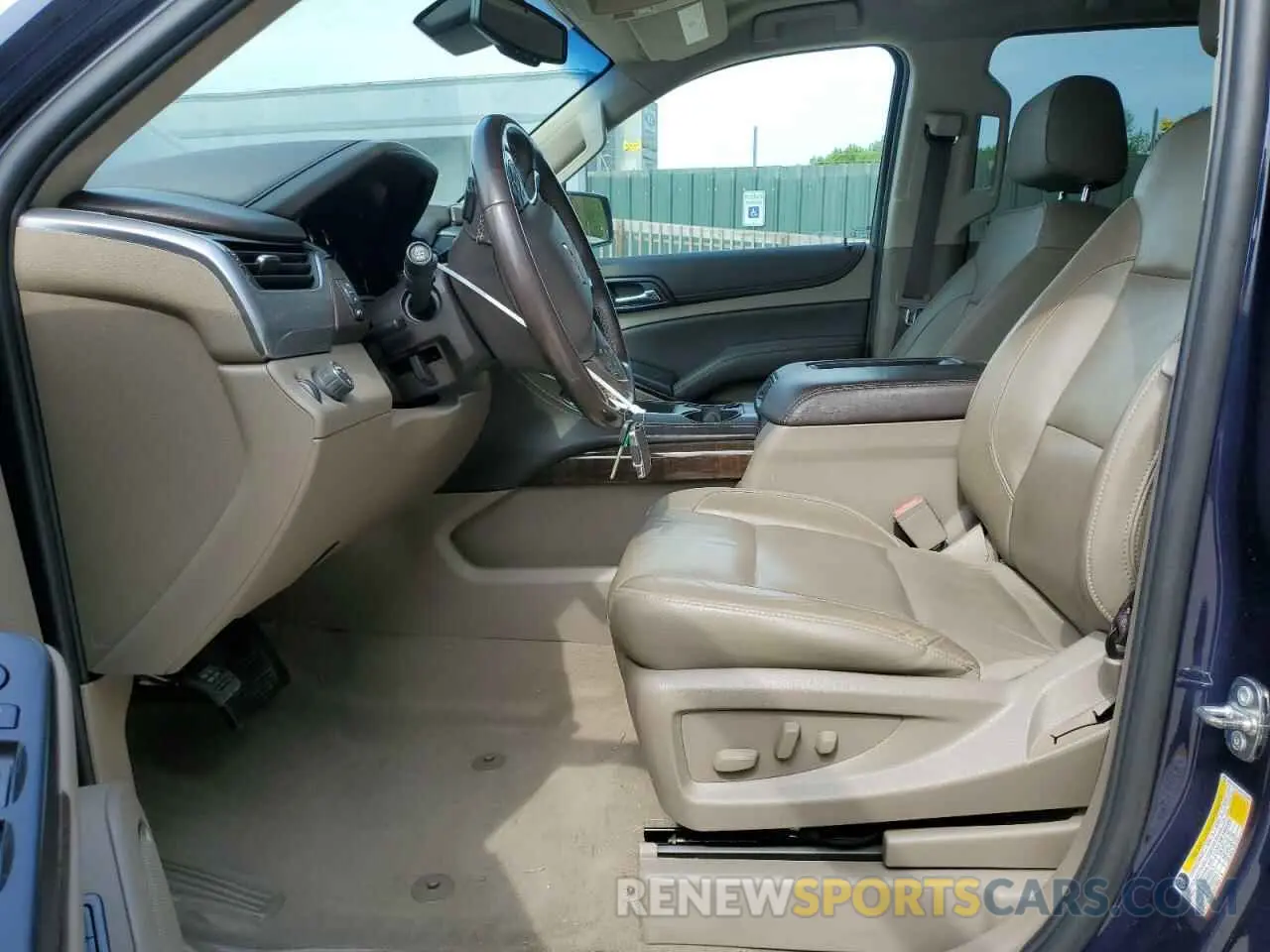7 Photograph of a damaged car 1GNSCBKCXKR289588 CHEVROLET TAHOE 2019