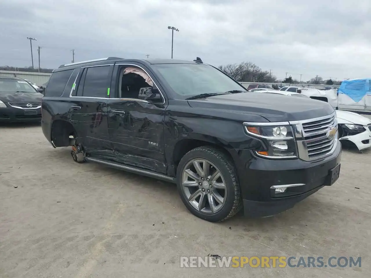 4 Photograph of a damaged car 1GNSCCKC7KR123468 CHEVROLET TAHOE 2019