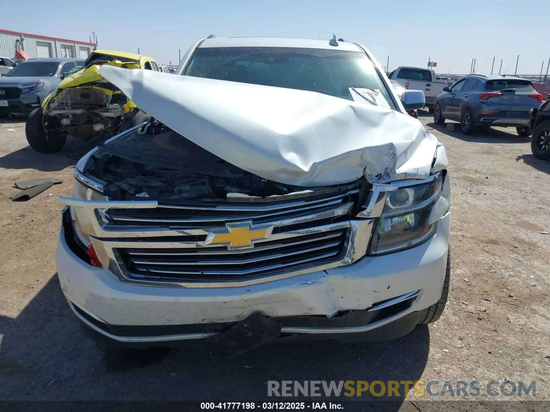 12 Photograph of a damaged car 1GNSCCKC9KR256636 CHEVROLET TAHOE 2019