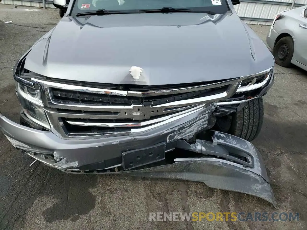 12 Photograph of a damaged car 1GNSKAECXKR285842 CHEVROLET TAHOE 2019