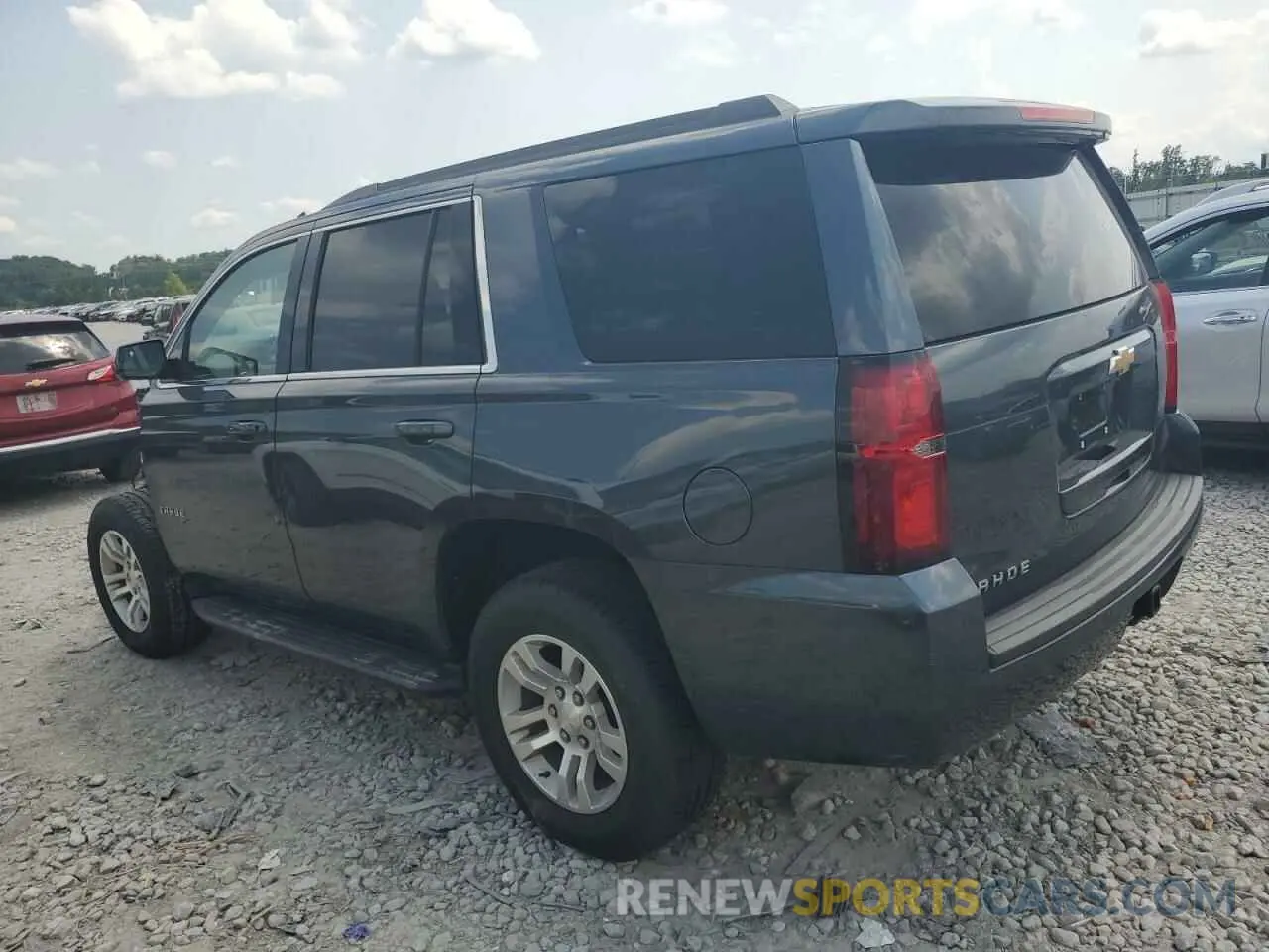 2 Photograph of a damaged car 1GNSKAKC2KR338635 CHEVROLET TAHOE 2019