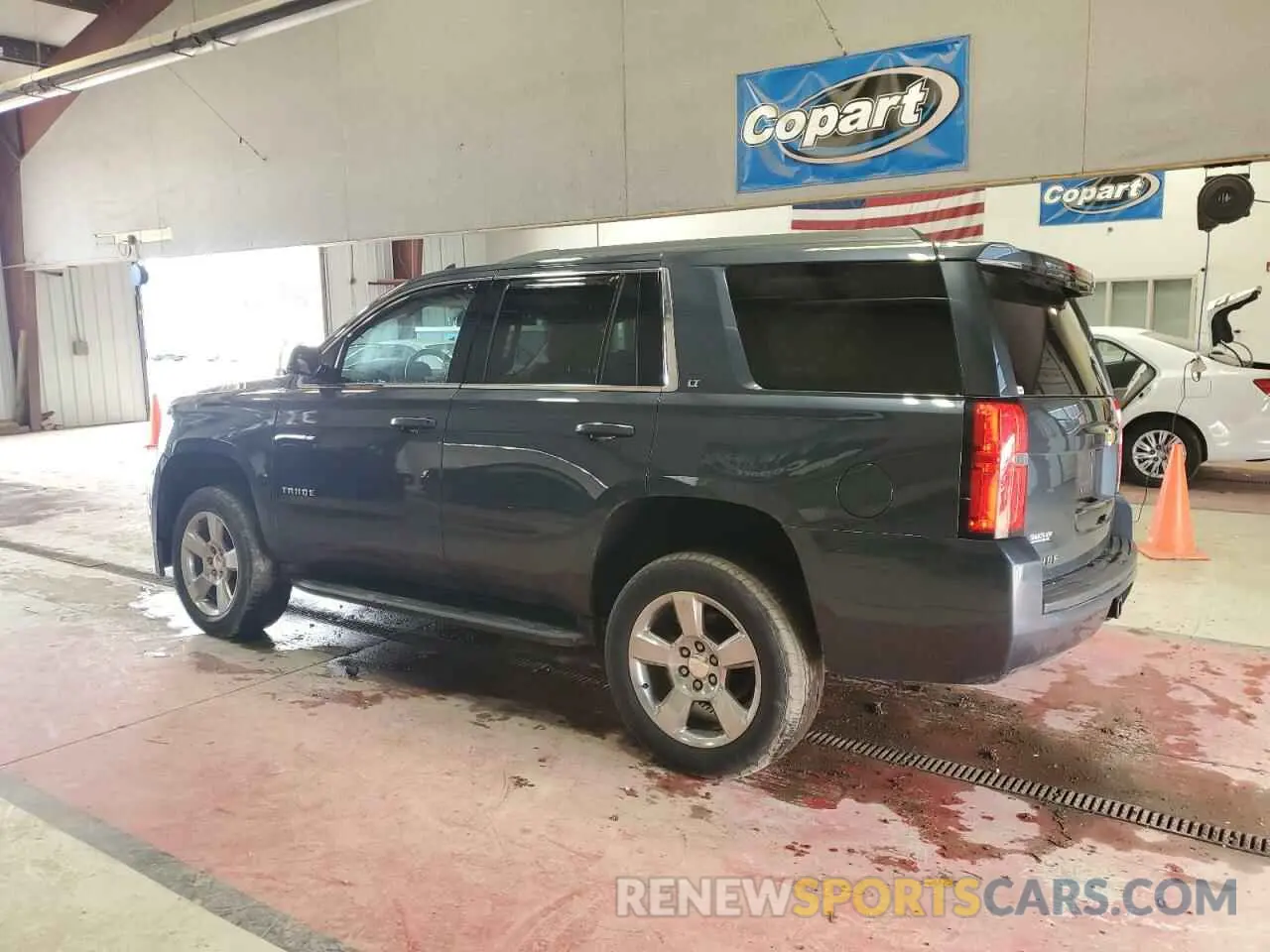2 Photograph of a damaged car 1GNSKBKC1KR357280 CHEVROLET TAHOE 2019