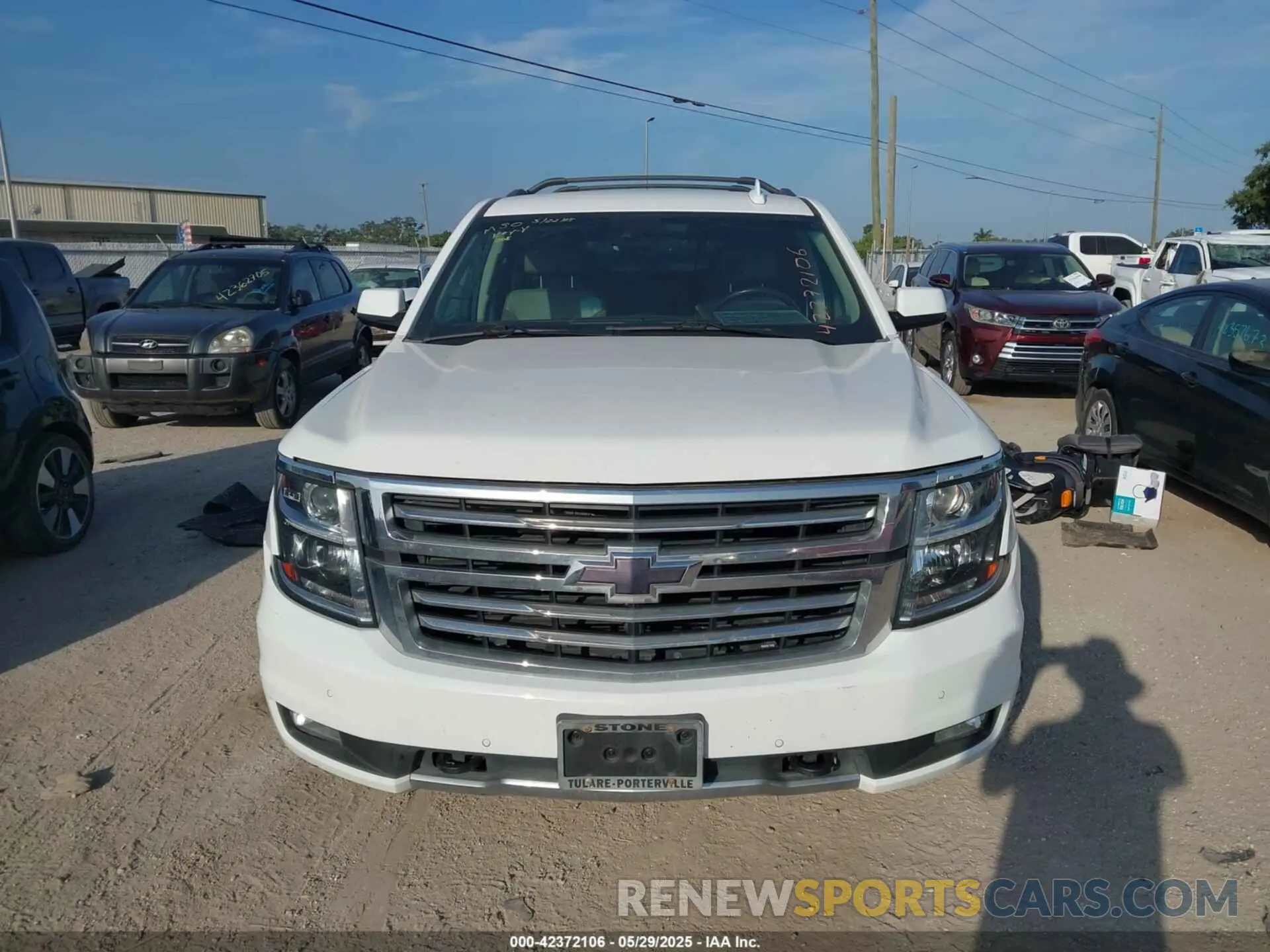 12 Photograph of a damaged car 1GNSKBKC2KR253915 CHEVROLET TAHOE 2019