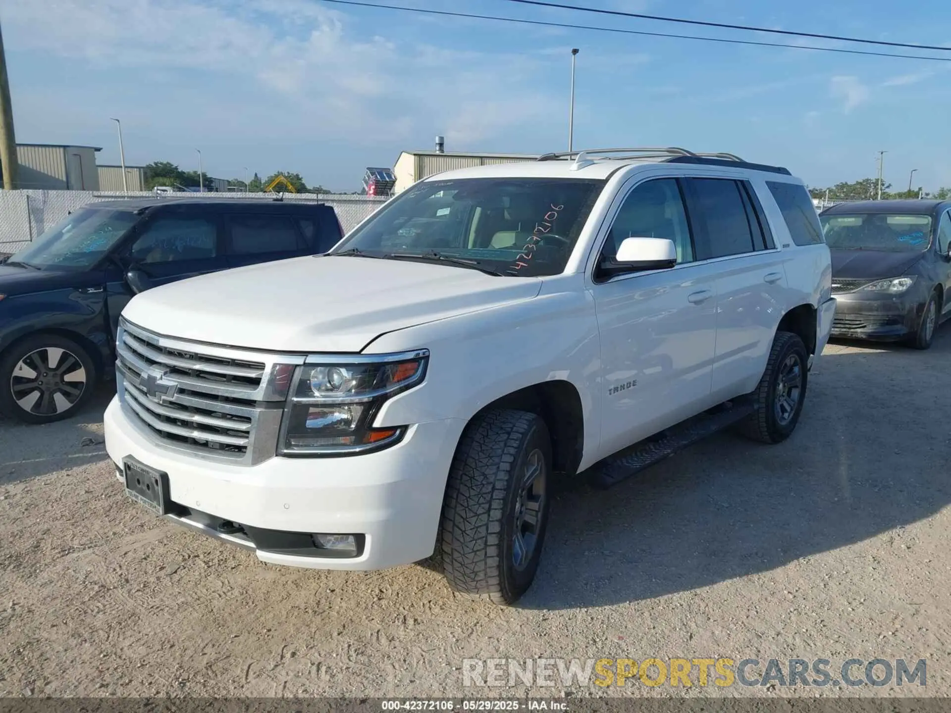 2 Photograph of a damaged car 1GNSKBKC2KR253915 CHEVROLET TAHOE 2019