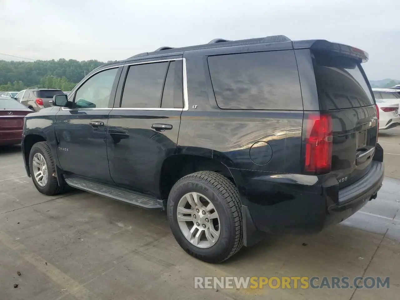 2 Photograph of a damaged car 1GNSKBKC2KR349527 CHEVROLET TAHOE 2019