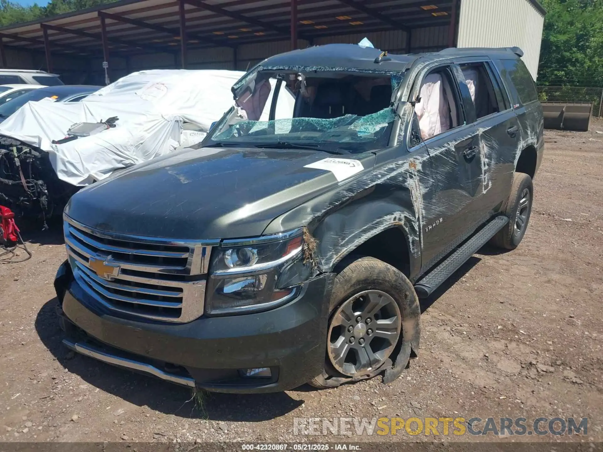 2 Photograph of a damaged car 1GNSKBKC3KR226710 CHEVROLET TAHOE 2019