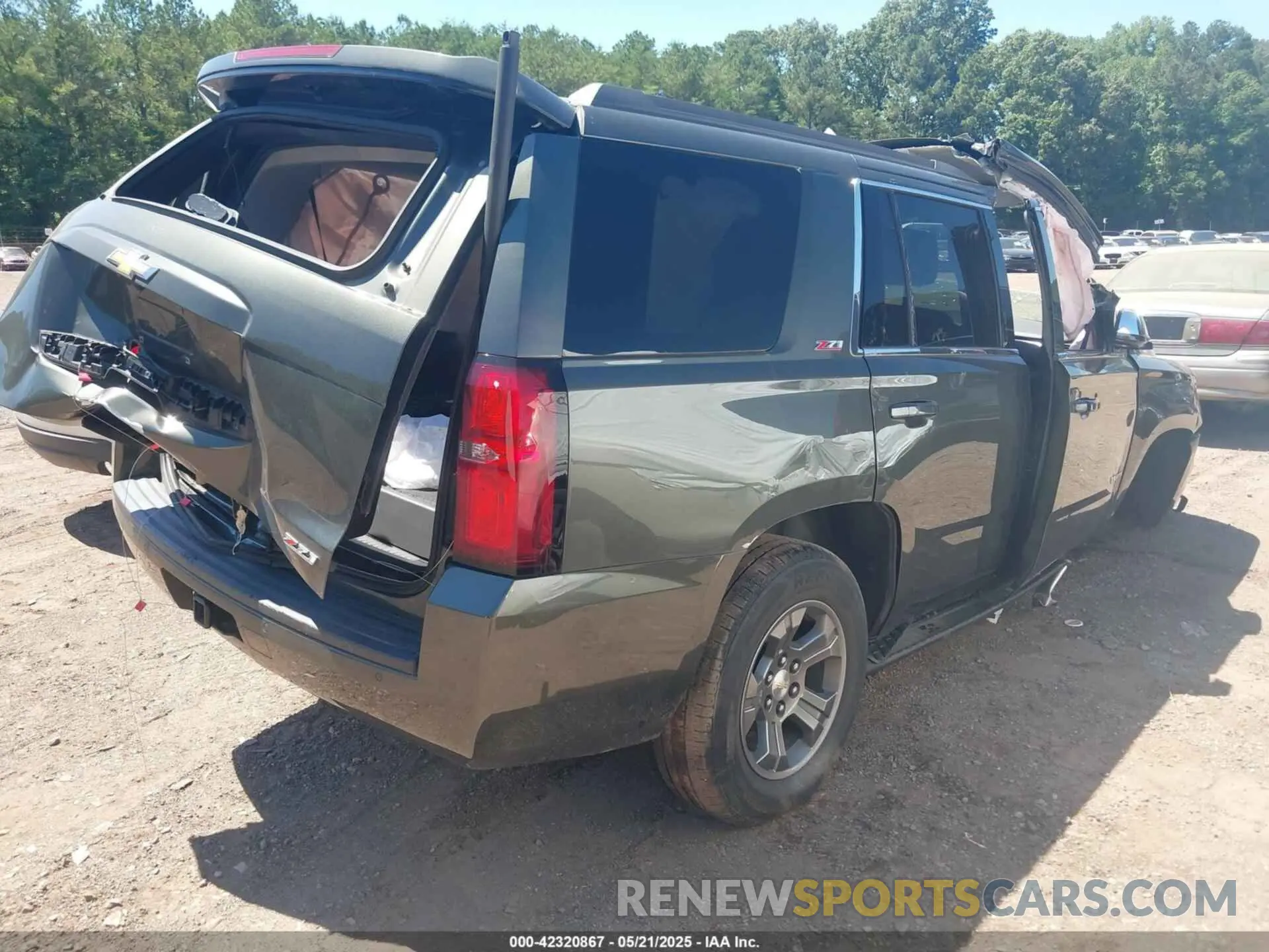 4 Photograph of a damaged car 1GNSKBKC3KR226710 CHEVROLET TAHOE 2019